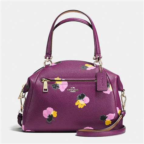 small coach purse with flowers